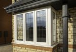 White uPVC bow and bay windows in Bournemouth, Dorset.