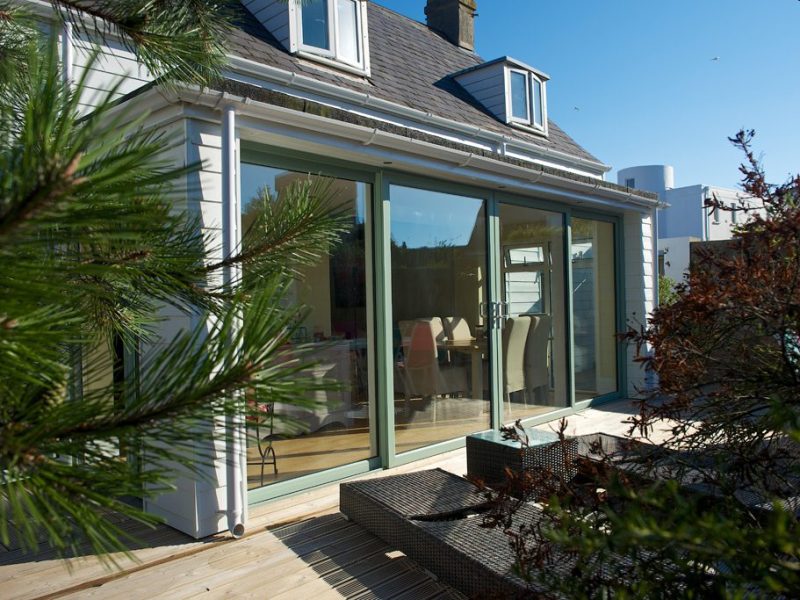 Green patio doors for a home in Bournemouth.