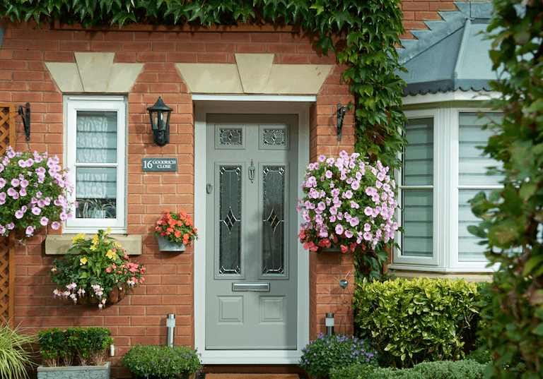 A red composite front door in Bournemouth
